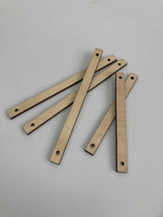 Birch wooden, lasercut sticks with two holes. In two sizes. Perfect to hang your work!